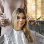 Women getting a haircut in Women hair salon Oakville