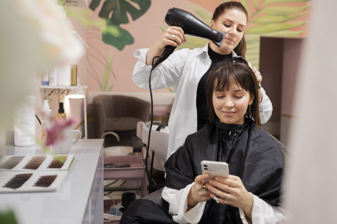 Women in salon of Oakville getting hair treatment