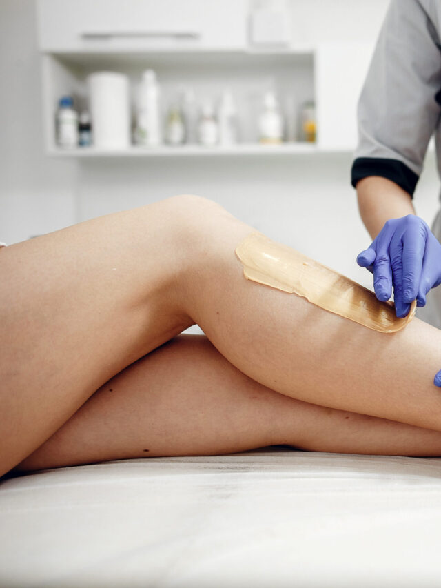 Beautiful young girl doing waxing in women salon