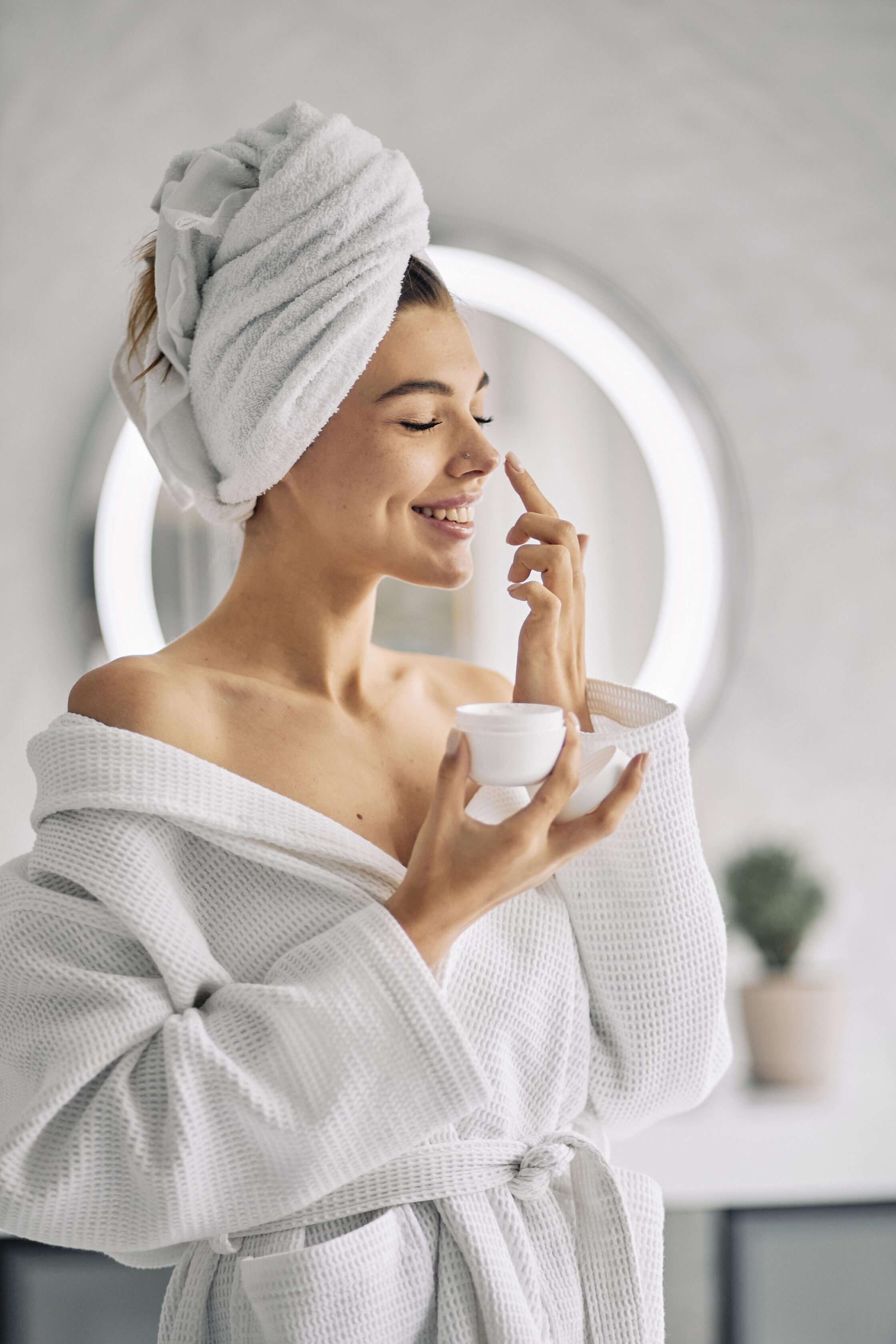 Young woman doing facial in women salon in Canada